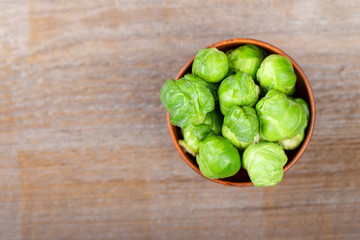 Brussels sprouts on a wooden background