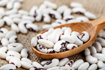 raw beans sprinkled on the table