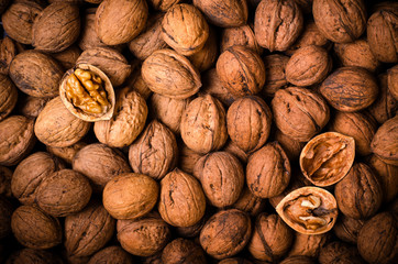 Whole Walnuts background, food concept. Top view