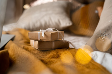 Gift boxes on bed