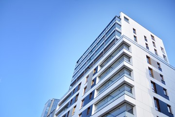 Fragment of modern residential apartment with flat buildings exterior. Detail of new luxury house...