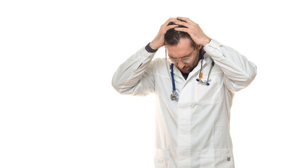Male doctor hloding hands on his head. Headache and pressure