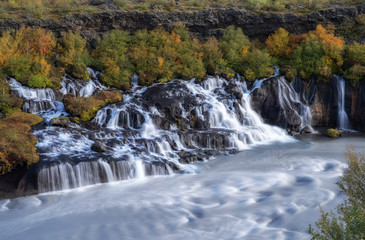 volcanic lava waterfall of Hraunfoss in Iceland