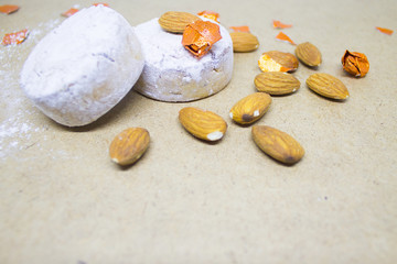 Background. Almond mantecado, polvoron on a background of brown paper