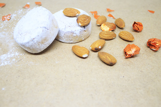 Background. Almond mantecado, polvoron on a background of brown paper