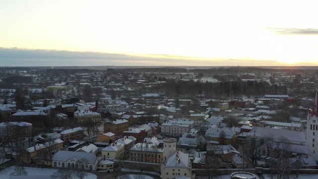 Aerial view of beautiful ruins of ancient Livonia castle in old town of Cesis, Latvia, winter morning sunrise time