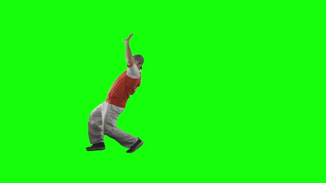 Male modern style dancer performing in the studio. Shot in 4k resolution with green screen background