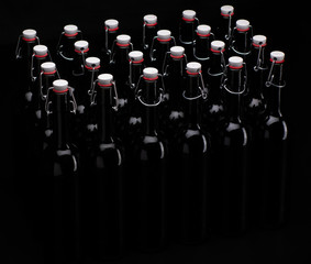 Wine bottles on black background