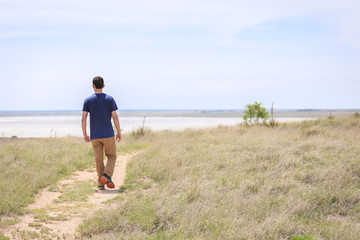 Quiet Walk by the Sea