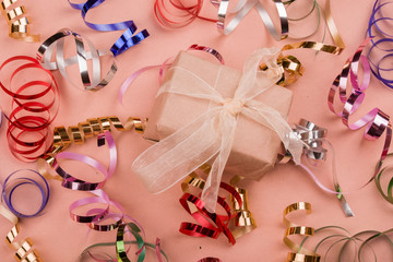 Beautiful festive red background with sparkles and Christmas golden toys. Holiday Content.