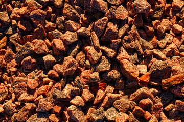 Stones crushed granite lit by the sun, close-up