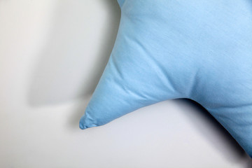 Pillow, baby pillow. Colored and star shaped pillow. On white background