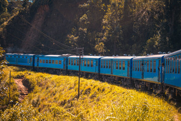 Blue train on railway in Sri Lanka