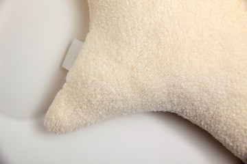 Baby pillow on white background, top view