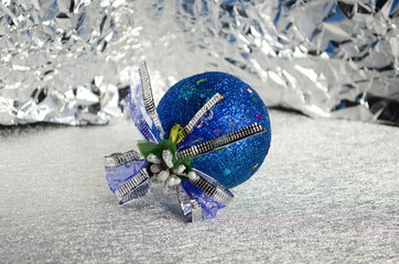 Blue Christmas toy on the silver background