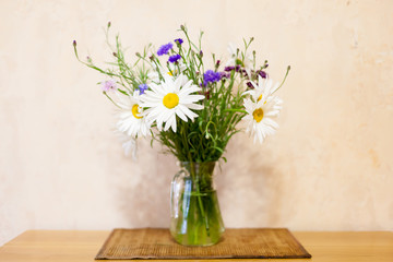 Bouquet of daisies and cornflowers