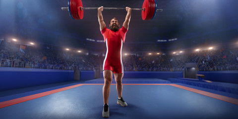 Male athlete is lifting a barbell on a professional stadium. Stadium and crowd are made in 3d. - obrazy, fototapety, plakaty