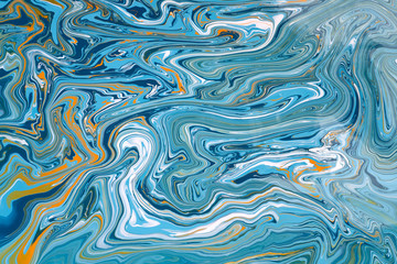 Blue acrylic liquid paint abstract surface
