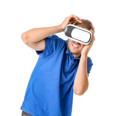 Young man with VR glasses on white background