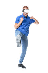 Young man with VR glasses on white background