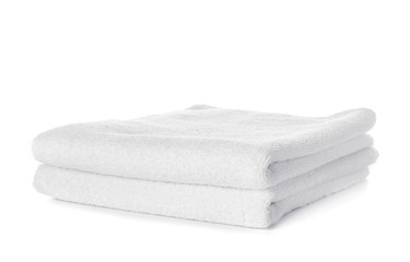 Stack of clean towels isolated on white