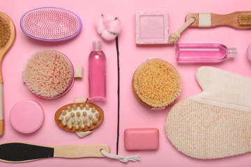 Cosmetics and accessories for bath on color background