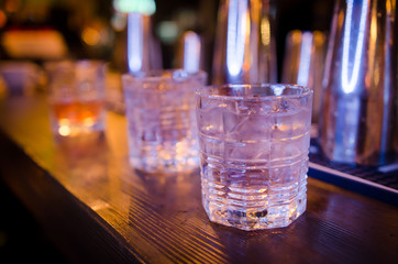 Glasses with gin and tonic in an old-fashioned glass
