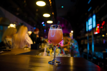 Glass of Aperol Spritz cocktail on bar counter
