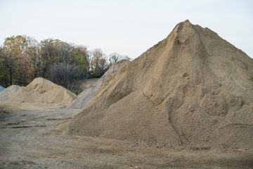 Piles of sand of various gramature