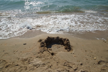paradise coast sand castle on the sea beach