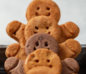 Collection of various gingerbread men in rows