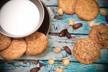 Vegan breafast with peanut butter, almond milk, whole grain cookies, hazelnuts