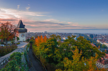 Cityscape of Graz and the famous clock tower (Grazer Uhrturm) on Shlossberg hill, Graz, Styria...