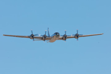 Front view of a rare WWII bomber (B-29 Superfortress) flying 