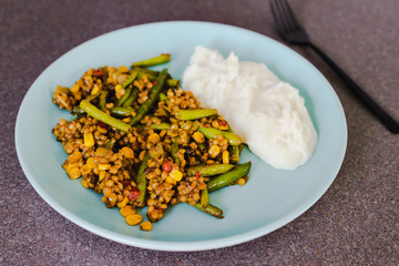 vegan mixed sauteed veggies cous cous with mash potatoes