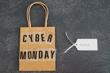 cyber monday shopping bag with Sales price tag next to it