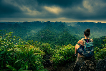 Cat Ba National Park Top of the Hill Young Woman enjoys beautiful view from the Ngu Lam peak in Kim...