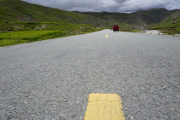 lonely car on a mountain street