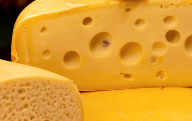 Pieces of schweitzer cheese and cheddar prepared by the house, at the Christmas market