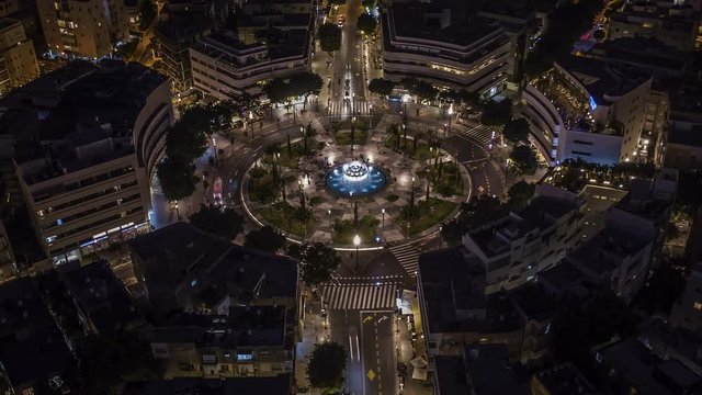 Big roundabout - Aerial hyperlapse - Dizengoff square in tel Aviv, Israel, at night, 4k drone view