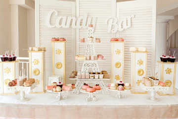 Candy Bar. Delicious sweet buffet with cupcakes. Sweet holiday buffet with cupcakes and other desserts.