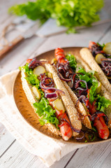 Hot dog with red onion