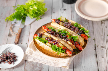 Hot dog with red onion