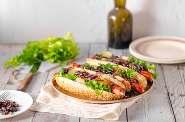 Hot dog with red onion