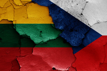 flags of Lithuania and Czech Republic painted on cracked wall