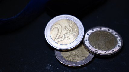 2 euro coins stacked on top of each other, usb drive. Concept of money and information