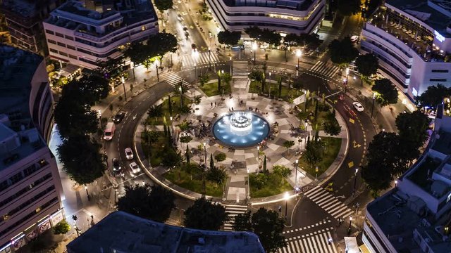 Big roundabout - Aerial hyperlapse - Dizengoff square in tel Aviv, Israel, at night, 4k drone view