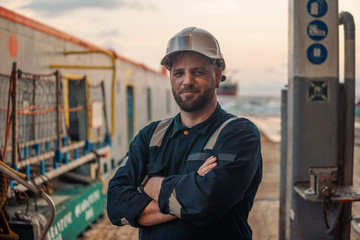 Marine Deck Officer or Chief mate on deck of offshore vessel or ship , wearing PPE personal...