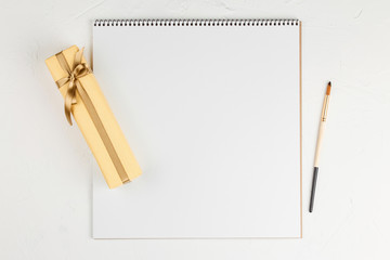 Congratulatory letter with presents on the table.