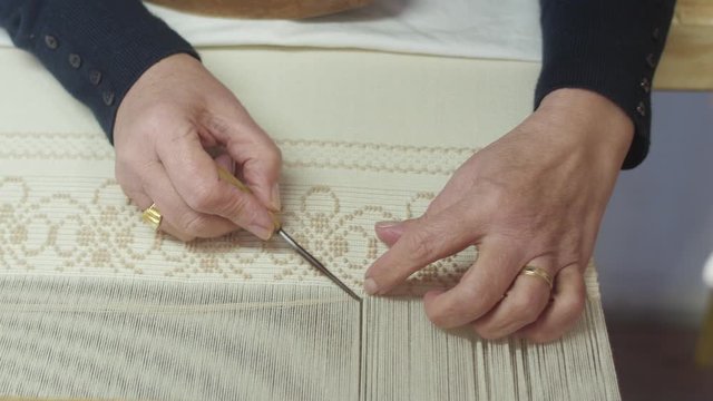 making traditional tapestry on a wooden weaving loom 4k